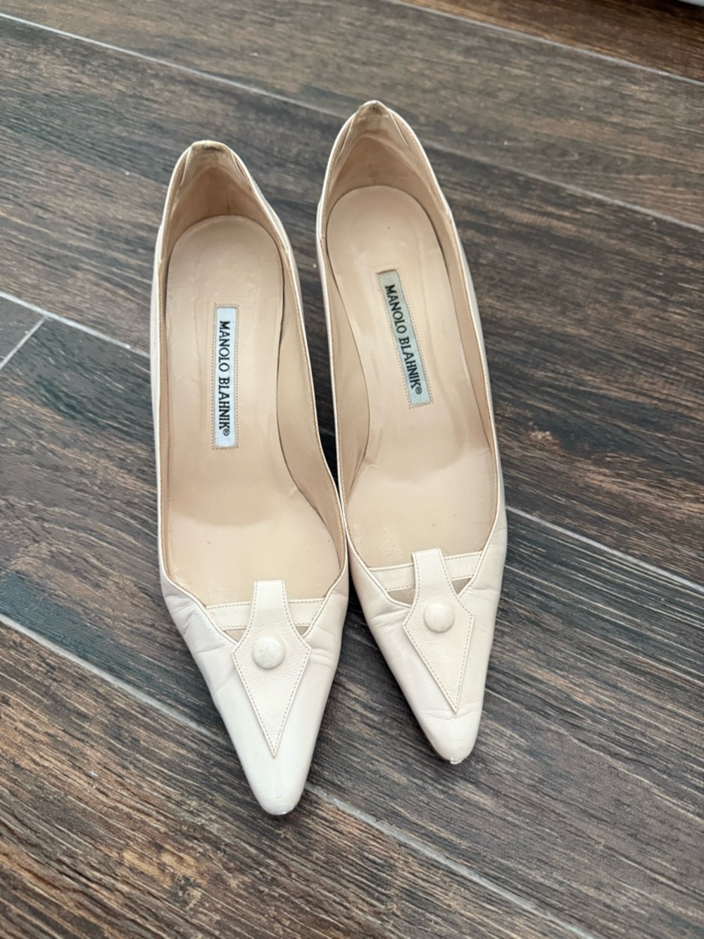 Manolo Blahnik Ivory Pointed-Toe Leather Pumps with Button Detail